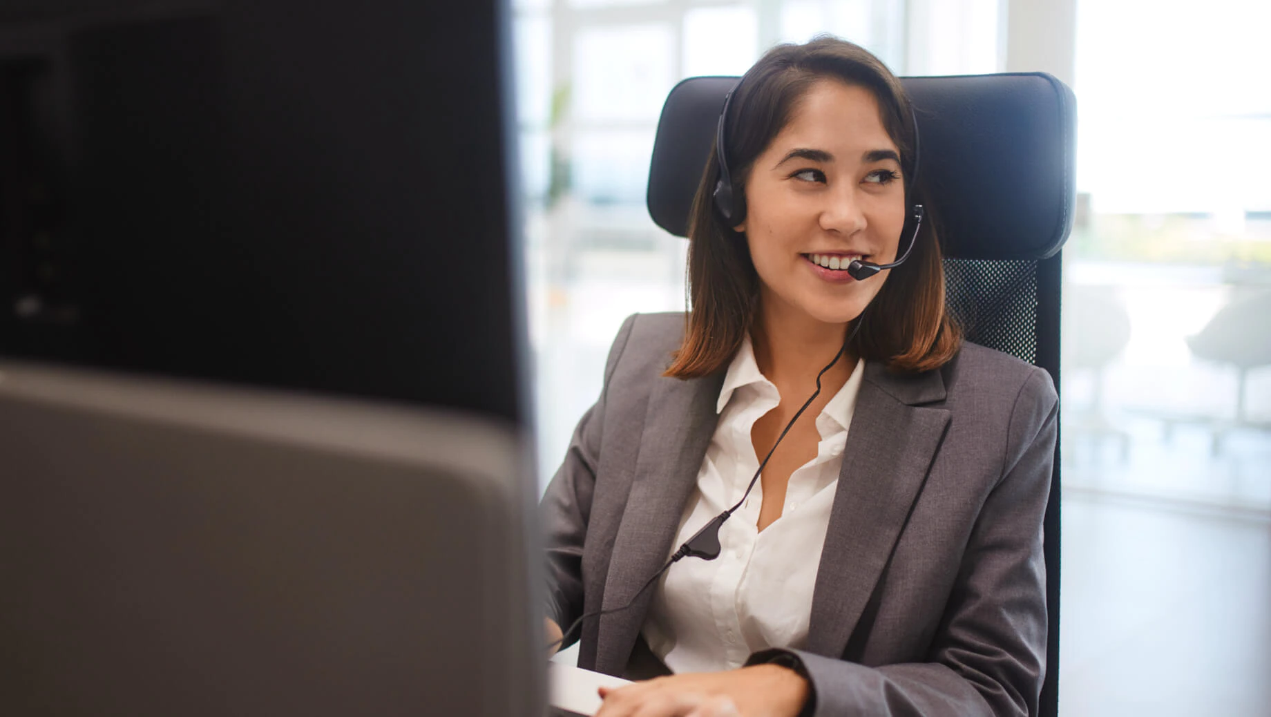 Female Schwab rep on headset
